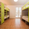  Foto von 1 Bett in Mehrbettzimmer